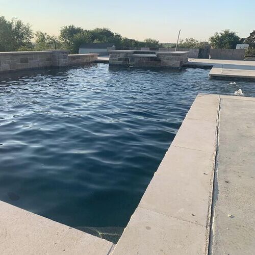 straight line pool with water feature